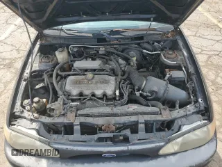 1998 Ford Escort SE with VIN 1FAFP13P9WW174004, listed as a Copart auction lot 65843664 with 101,507 mi miles and Clean Title. Bid and sale history available at carsss.com. Image 11.