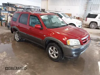 2006 Mazda Tribute S with VIN 4F2YZ06196KM14531, listed as a IAAI auction lot 41594920 with 297,204 mi miles and . Bid and sale history available at carsss.com. Image 1.