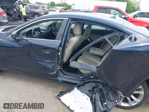 2016 Mazda Mazda6 i Touring with VIN JM1GJ1V59G1402867, listed as a IAAI auction lot 41998212 with 135,724 mi miles. Bid and sale history available at carsss.com. Image 14.