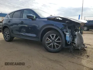 2017 Mazda CX-5 Grand Touring with VIN JM3KFBDL8H0163179, listed as a Copart auction lot 49866865 with 53,066 mi miles and Salvage Title. Bid and sale history available at carsss.com. Image 4.