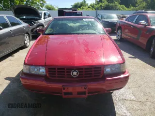 2000 Cadillac Eldorado Touring ETC z VIN 1G6ET129XYU191433, wystawiony jako Copart lot #58108224 z przebiegiem 76 957 mil mil oraz Szkody całkowita. Historia ofert i sprzedaży dostępna na DreamBid. Obrazek 5.