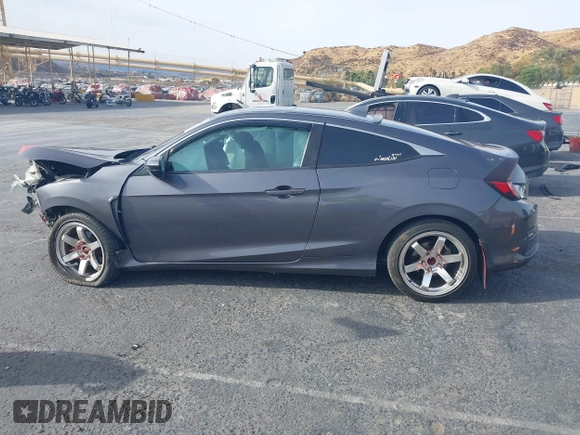 2016 Honda Civic EX-T with VIN 2HGFC3B31GH362257, listed as a IAAI auction lot 41072645 with 164,845 mi miles and . Bid and sale history available at DreamBid. Image 14.