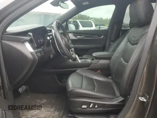 2020 Cadillac XT6 FWD Premium Luxury with VIN 1GYKPCRS4LZ133123, listed as a Copart auction lot 59411115 with 64,463 mi miles and Salvage title. Bid and sale history available at DreamBid. Image 7.