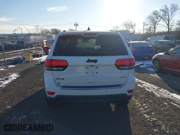 2014 Jeep Grand Cherokee Limited with VIN 1C4RJFBG7EC220677, listed as a IAAI auction lot 41177354 with 148,445 mi miles and . Bid and sale history available at DreamBid. Image 16.