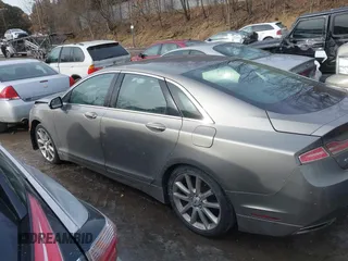 2015 Lincoln MKZ z VIN 3LN6L2JK4FR610596, wystawiony jako IAAI lot #41443285 z przebiegiem 114 363 mil mil oraz . Historia ofert i sprzedaży dostępna na DreamBid. Obrazek 14.