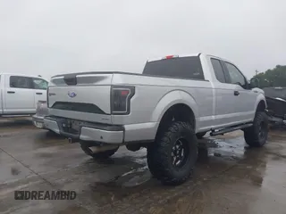 2015 Ford F-150 XL with VIN 1FTEX1C86FKE20397, listed as a IAAI auction lot 42203979 with 101,695 mi miles and . Bid and sale history available at DreamBid. Image 4.