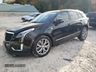 2021 Cadillac XT5 AWD Sport z VIN 1GYKNGRS4MZ182899, wystawiony jako Copart lot #74829774 z przebiegiem 34 125 mil mil oraz Szkoda całkowita • Salvage title. Historia ofert i sprzedaży dostępna na DreamBid. Obrazek 1.