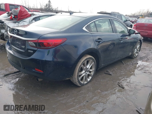 2016 Mazda Mazda6 i Touring with VIN JM1GJ1T54G1434497, listed as a IAAI auction lot 41654012 with 133,901 mi miles. Bid and sale history available at carsss.com. Image 4.