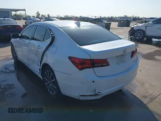 2015 Acura TLX V6 Advance with VIN 19UUB3F7XFA006457, listed as a IAAI auction lot 41969272 with 99,715 mi miles. Bid and sale history available at carsss.com. Image 3.