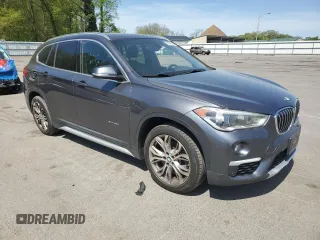 2017 BMW X1 xDrive28i z VIN WBXHT3Z37H4A54544, wystawiony jako Copart lot #55019535 z przebiegiem 76 822 mil mil oraz Szkoda całkowita • Salvage title. Historia ofert i sprzedaży dostępna na DreamBid. Obrazek 4.