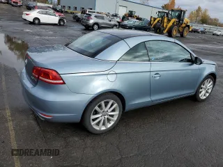 2013 Volkswagen Eos Komfort with VIN WVWBW8AH9DV007077, listed as a Copart auction lot 80254434 with 87,620 mi miles and Salvage Title. Bid and sale history available at DreamBid. Image 3.