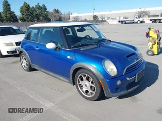 2005 MINI Hardtop S with VIN WMWRE33425TG95600, listed as a IAAI auction lot 41764486 with 157,846 mi miles and . Bid and sale history available at DreamBid. Image 1.