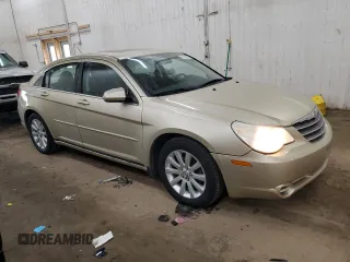2010 Chrysler Sebring Limited with VIN 1C3CC5FD1AN190847, listed as a Copart auction lot 51219675 with 144,025 mi miles and Salvage title. Bid and sale history available at DreamBid. Image 4.