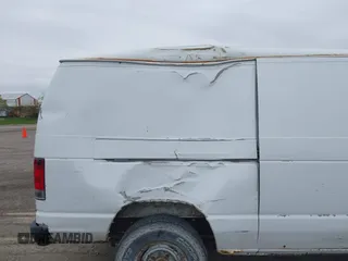 2006 Ford Econoline Cargo with VIN 1FTNE24W86DA21116, listed as a IAAI auction lot 42142204 with 133,272 mi miles and . Bid and sale history available at DreamBid. Image 12.