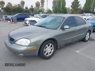 2001 Mercury Sable LS with VIN 1MEHM55S31G600405, listed as a IAAI auction lot 42175214 with 196,492 mi miles and . Bid and sale history available at carsss.com. Image 2.