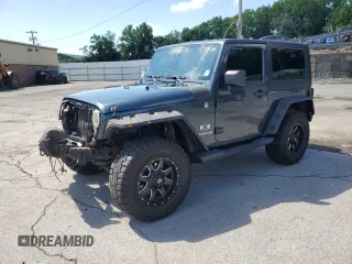 2007 Jeep Wrangler X with VIN 1J4FA24117L170294, listed as a Copart auction lot 64806715 with 132,130 mi miles and Salvage title. Bid and sale history available at DreamBid. Image 1.