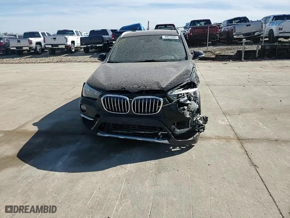 2018 BMW X1 sDrive28i with VIN WBXHU7C31J5H39068, listed as a Copart auction lot 49018985 with 100,611 mi miles and Salvage Title. Bid and sale history available at carsss.com. Image 11.