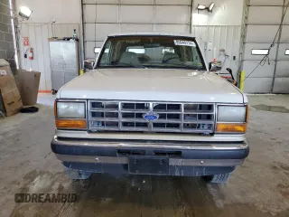 1990 Ford Bronco z VIN 1FMCU14T9LUA62663, wystawiony jako Copart lot #85040114 z przebiegiem 9 963 mil mil oraz Czysty tytuł • Clean title. Historia ofert i sprzedaży dostępna na DreamBid. Obrazek 5.