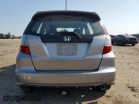 2010 Honda Fit Sport with VIN JHMGE8H47AS023964, listed as a Copart auction lot 61797995 with 78,518 mi miles and Salvage title. Bid and sale history available at DreamBid. Image 6.