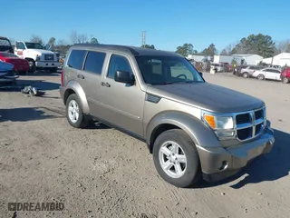 2007 Dodge Nitro SLT with VIN 1D8GU58K17W644847, listed as a IAAI auction lot 41462223 with 220,325 mi miles. Bid and sale history available at carsss.com. Image 1.