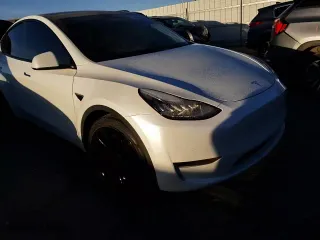 2021 Tesla Model Y Performance with VIN 5YJYGDEF4MF073074, listed as a Copart auction lot 84508354 with 76,398 mi miles and Salvage Title. Bid and sale history available at carsss.com. Image 10.