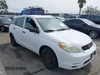 2004 Toyota Matrix Std with VIN 2T1KR32E84C299631, listed as a IAAI auction lot 41696061 with 299,999 mi miles. Bid and sale history available at carsss.com. Image 1.