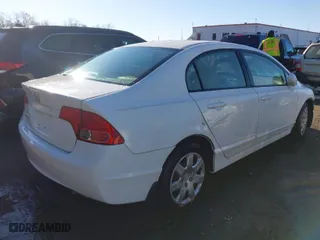 2006 Honda Civic Sdn LX with VIN 1HGFA16596L097028, listed as a IAAI auction lot 41561514 with 73,153 mi miles. Bid and sale history available at carsss.com. Image 4.