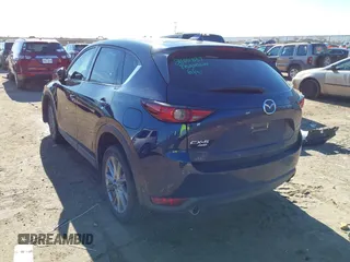 2019 Mazda CX-5 Grand Touring with VIN JM3KFBDM2K1685168, listed as a IAAI auction lot 41323598 with 88,429 mi miles. Bid and sale history available at carsss.com. Image 3.