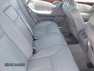 2002 Mercedes-Benz E-Class with VIN WDBJF65J72B441380, listed as a IAAI auction lot 42040268 with 210,471 mi miles. Bid and sale history available at carsss.com. Image 8.
