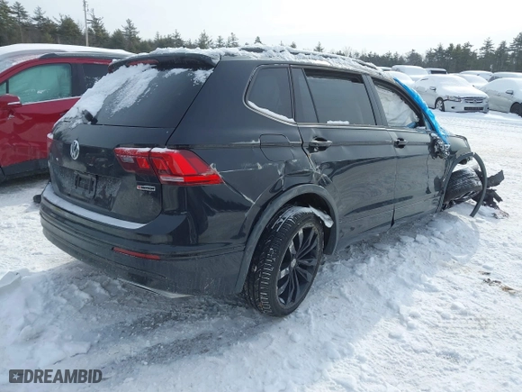 2020 Volkswagen Tiguan SE with VIN 3VV2B7AX4LM136531, listed as a IAAI auction lot 41528490 with 62,659 mi miles. Bid and sale history available at carsss.com. Image 4.