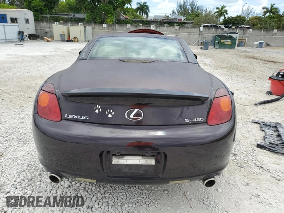 2002 Lexus SC 430 with VIN JTHFN48Y720002987, listed as a Copart auction lot 55450785 with 91,164 mi miles and Salvage title. Bid and sale history available at DreamBid. Image 6.