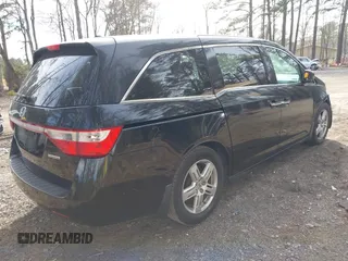 2013 Honda Odyssey Touring with VIN 5FNRL5H96DB003796, listed as a IAAI auction lot 41828376 with 6,308 mi miles and . Bid and sale history available at carsss.com. Image 4.