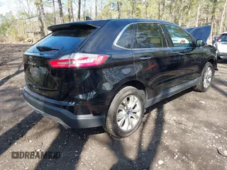 2022 Ford Edge Titanium with VIN 2FMPK4K95NBB06151, listed as a IAAI auction lot 41932545 with 57,762 mi miles and . Bid and sale history available at DreamBid. Image 4.