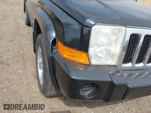 2007 Jeep Commander Sport with VIN 1J8HG48K17C651084, listed as a IAAI auction lot 42064395 with 212,057 mi miles. Bid and sale history available at carsss.com. Image 6.