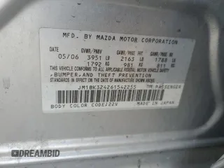 2006 Mazda 3 s with VIN JM1BK324261542255, listed as a Copart auction lot 84252034 with 196,030 mi miles and Salvage Title. Bid and sale history available at DreamBid. Image 12.