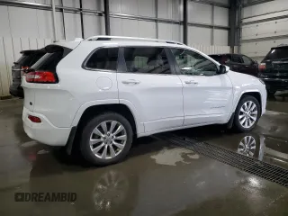 2016 Jeep Cherokee Overland with VIN 1C4PJLJB0GW302604, listed as a Copart auction lot 70624834 with 96,394 mi miles and Salvage title. Bid and sale history available at DreamBid. Image 3.