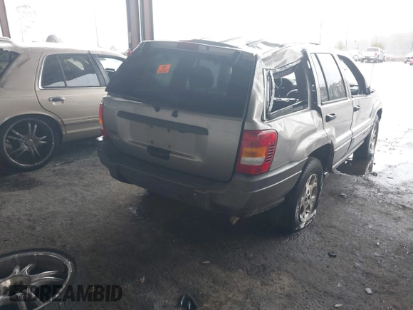 2001 Jeep Grand Cherokee Laredo with VIN 1J4GX48S51C708990, listed as a IAAI auction lot 41656323 with 198,124 mi miles and . Bid and sale history available at DreamBid. Image 4.