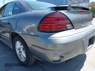 2004 Pontiac Grand Am SE1 with VIN 1G2NF52E84C214785, listed as a IAAI auction lot 42529688 with 124,415 mi miles and . Bid and sale history available at DreamBid. Image 6.