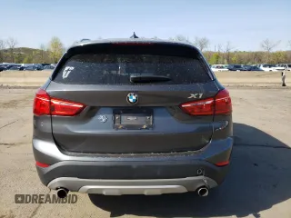 2018 BMW X1 xDrive28i with VIN WBXHT3C33J5K31838, listed as a Copart auction lot 48650943 with 63,064 mi miles. Bid and sale history available at carsss.com. Image 6.