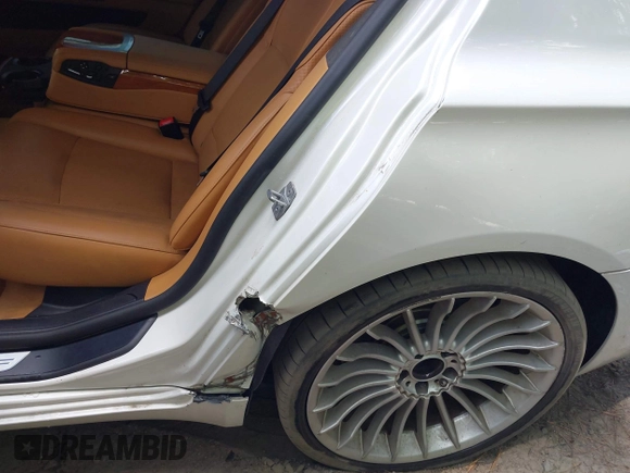 2013 BMW 7 Series 750Li with VIN WBAYE8C55DDS16013, listed as a IAAI auction lot 42709519 with 123,405 mi miles and . Bid and sale history available at DreamBid. Image 17.