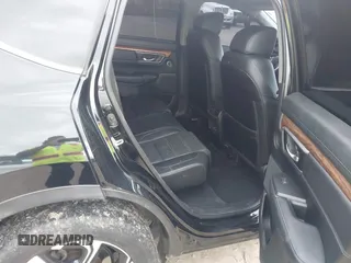 2017 Honda CR-V Touring with VIN 2HKRW2H96HH672017, listed as a IAAI auction lot 42151118 with 144,527 mi miles and . Bid and sale history available at carsss.com. Image 8.