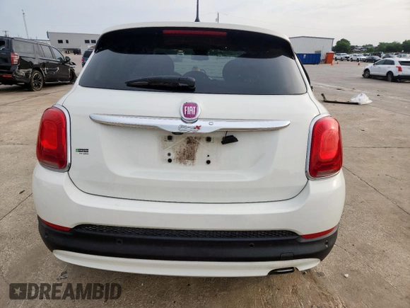 2018 FIAT 500X Lounge with VIN ZFBCFXDB9JP651302, listed as a Copart auction lot 59435875 with 63,186 mi miles and Salvage title. Bid and sale history available at DreamBid. Image 6.
