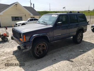 2001 Jeep Cherokee Sport z VIN 1J4FF58S11L616151, wystawiony jako Copart lot #59372005 z przebiegiem 212 142 mil mil oraz Szkoda całkowita • Salvage title. Historia ofert i sprzedaży dostępna na DreamBid. Obrazek 1.