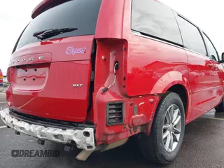 2014 Dodge Grand Caravan SXT with VIN 2C4RDGCG3ER257695, listed as a IAAI auction lot 41534568 with 116,896 mi miles and . Bid and sale history available at DreamBid. Image 18.