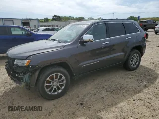 2014 Jeep Grand Cherokee Limited with VIN 1C4RJFBM2EC375109, listed as a Copart auction lot 51942195 with 165,317 mi miles and Salvage title. Bid and sale history available at DreamBid. Image 1.