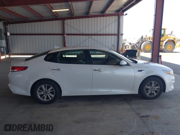 2016 Kia Optima LX with VIN KNAGT4L34G5105864, listed as a IAAI auction lot 42161194 with 106,351 mi miles. Bid and sale history available at carsss.com. Image 13.