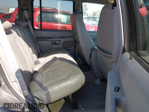 1999 Ford Explorer XLT z VIN 1FMZU32E8XUA34921, wystawiony jako IAAI lot #42162432 z przebiegiem 263 443 mil mil oraz . Historia ofert i sprzedaży dostępna na DreamBid. Obrazek 8.