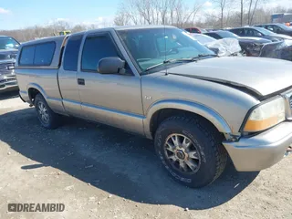 2003 GMC Sonoma SLS with VIN 1GTDT19X038247958, listed as a IAAI auction lot 42005992 with 134,857 mi miles. Bid and sale history available at carsss.com. Image 13.