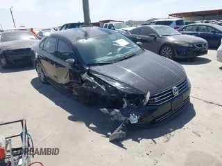 2018 Volkswagen Passat 2.0T S with VIN 1VWAA7A31JC015784, listed as a IAAI auction lot 41829586 with 72,437 mi miles. Bid and sale history available at carsss.com. Image 1.