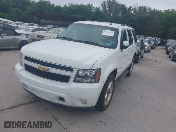 2007 Chevrolet Tahoe LT z VIN 1GNFC13027R112945, wystawiony jako IAAI lot #42178102 z przebiegiem 202 858 mil mil oraz . Historia ofert i sprzedaży dostępna na DreamBid. Obrazek 2.
